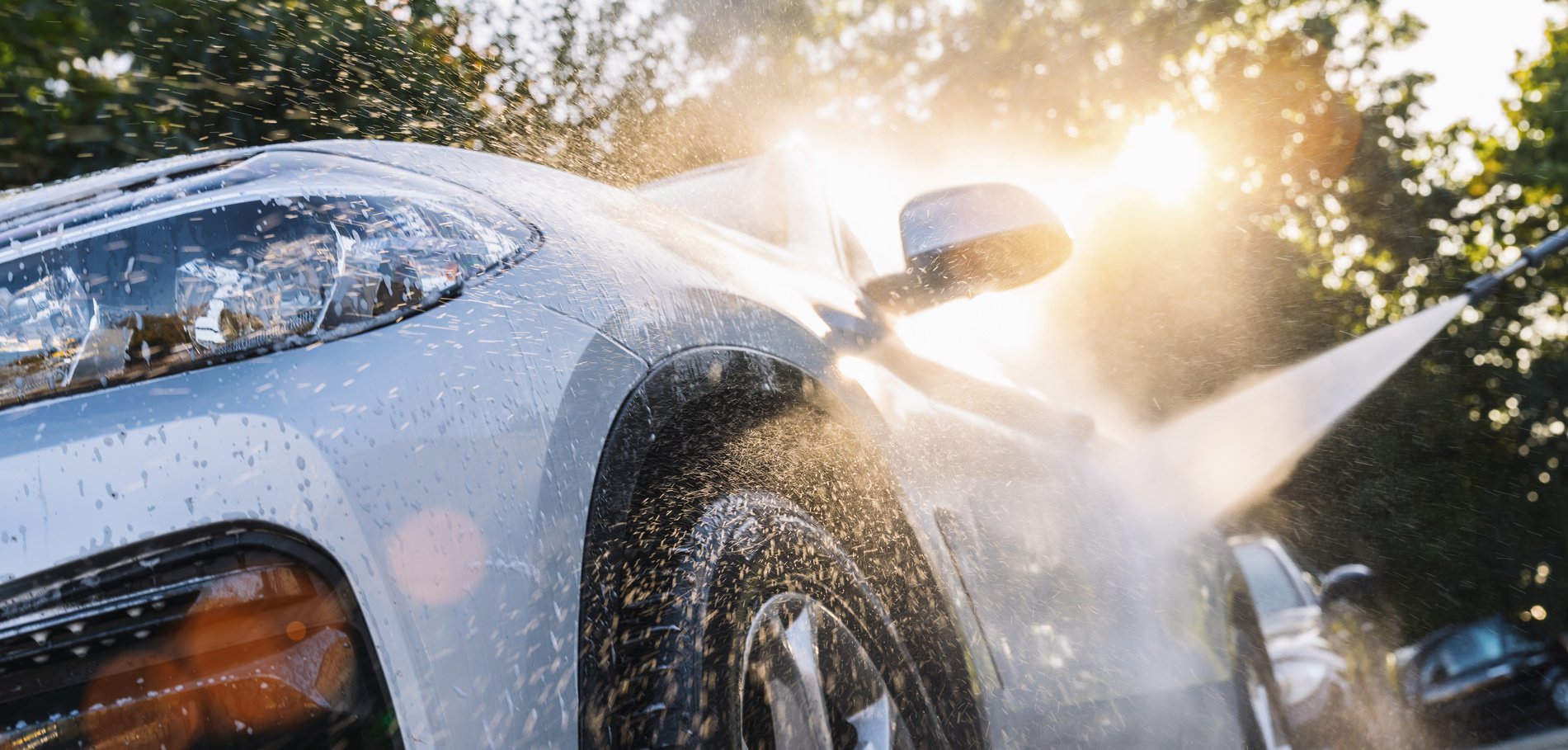 Car Washing. Cleaning Car Using High Pressure Water.